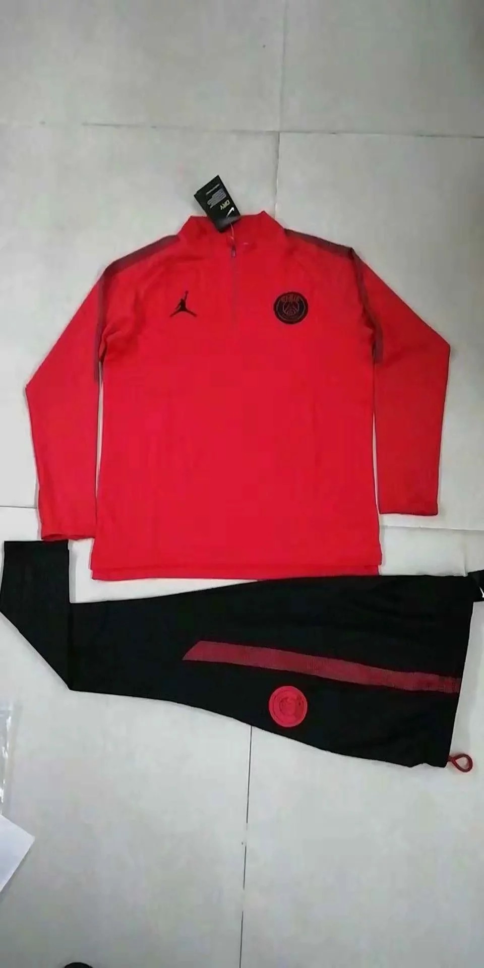 mbappe red nike tracksuit